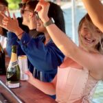 People partying on a Washington DC booze cruise. Potomac Paddle Club by Sea Suite Cruises.