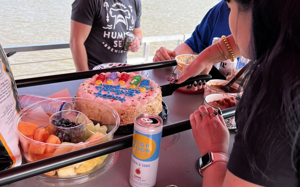 Birthday cake, snacks, and drinks on a bring your own food and BYOB birthday cruise in Richmond VA.