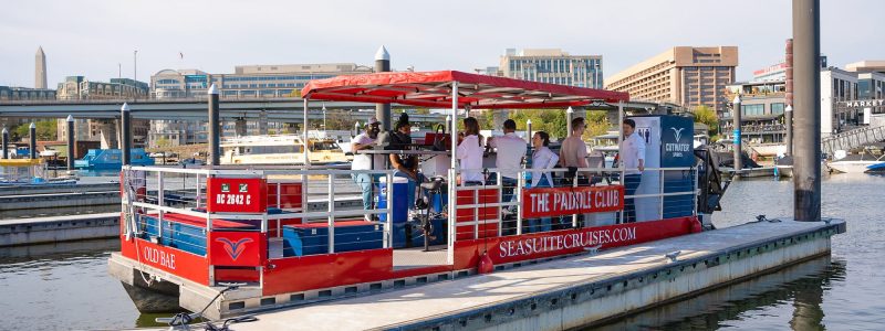 The Wharf paddle boat booze cruise near Washington DC. BYOB! People drinking on the water. Potomac Paddle Club by Sea Suite Cruises.